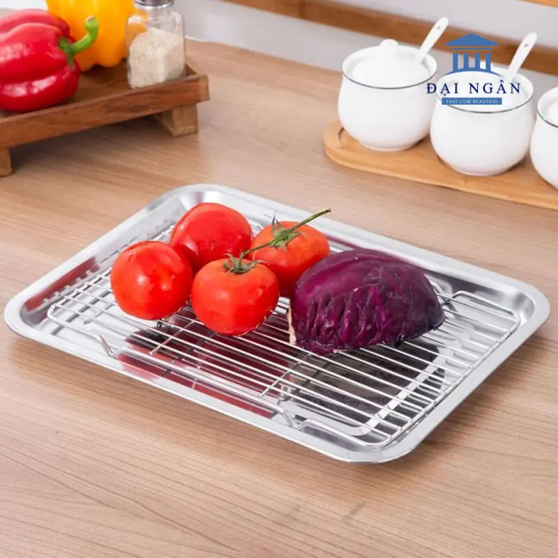 khay inox có cho vào lò nướng được không